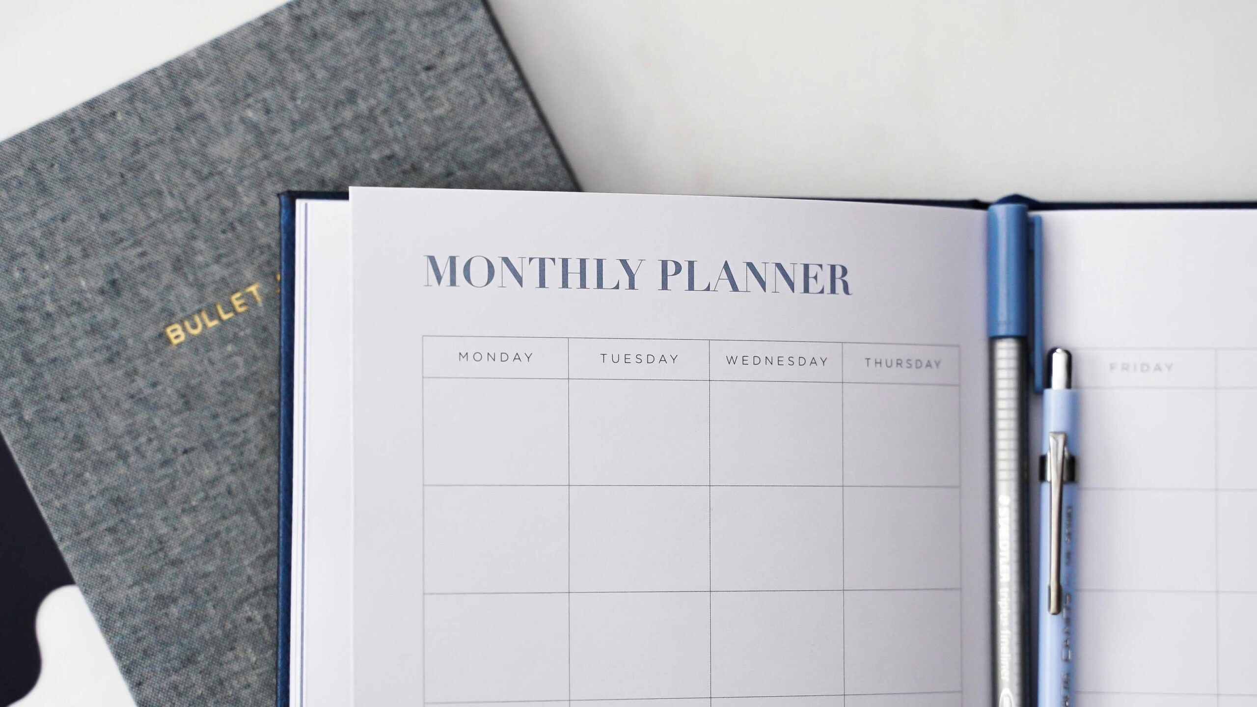 calendar with marked dates for long distance parenting visitation schedule planning