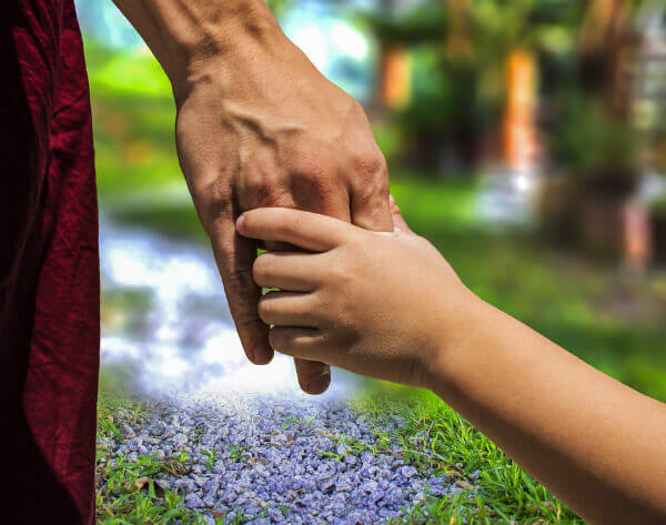 parent and child holding hands